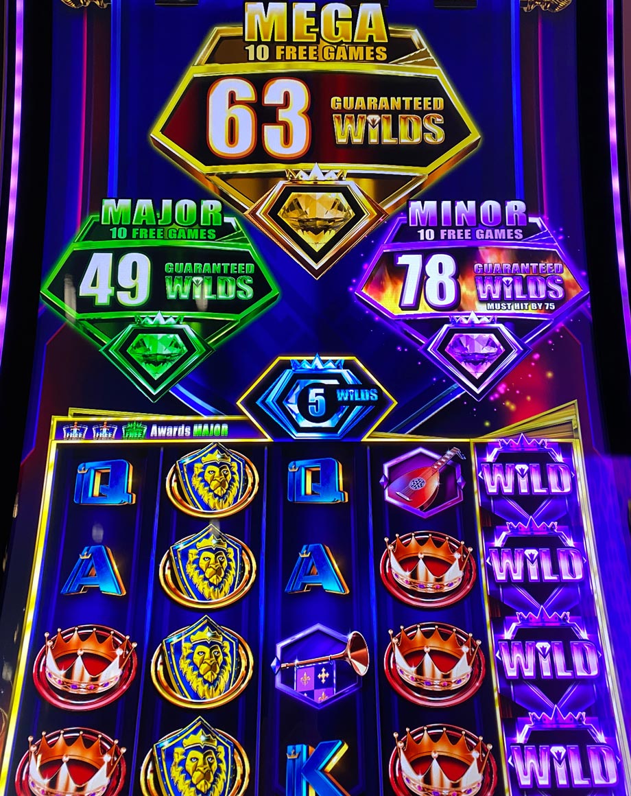 Slot machine screen with colorful graphics and